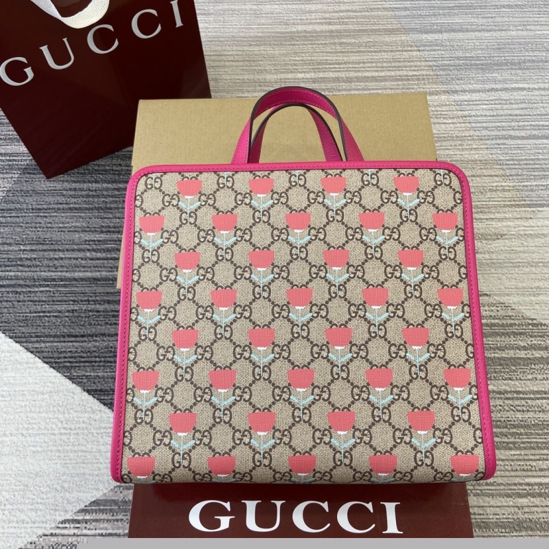G*u*i shopping bags